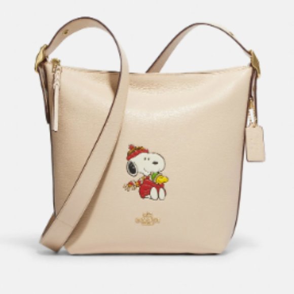 Coach Bags Nwt Coach X Peanuts Val Duffle With Snoopy Cuddle Motif